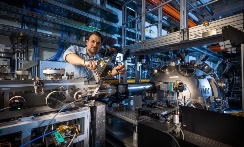 Laser strums atoms trillions of times in search for better computers